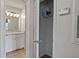 Bathroom featuring vanity, mirror, with adjacent closet at 4106 Chastain Park Ne Ct, Atlanta, GA 30342