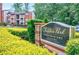 Chastain Park Condominiums community sign surrounded by greenery at 4106 Chastain Park Ne Ct, Atlanta, GA 30342
