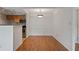 Bright dining room featuring beautiful hardwood floors and ample space for entertaining at 4106 Chastain Park Ne Ct, Atlanta, GA 30342