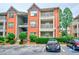 Charming brick condo building with well-maintained landscaping and assigned parking at 4106 Chastain Park Ne Ct, Atlanta, GA 30342