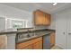 A well-equipped kitchen offering a stainless steel dishwasher, ample cabinets, and generous counter space at 4106 Chastain Park Ne Ct, Atlanta, GA 30342