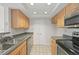 Well-maintained kitchen featuring stainless steel appliances, light cabinets, and neutral countertops at 4106 Chastain Park Ne Ct, Atlanta, GA 30342