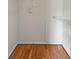 Spacious walk-in closet with hardwood flooring and shelving at 4106 Chastain Park Ne Ct, Atlanta, GA 30342