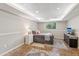 Finished basement area features a bedroom setup with neutral walls, decor and a small window at 440 Laurian Nw Way, Kennesaw, GA 30144