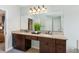 Bathroom featuring a large vanity with double sinks and a huge mirror at 440 Laurian Nw Way, Kennesaw, GA 30144