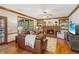 Spacious living room with fireplace, built-in shelves, hardwood floors, and natural light from large windows at 440 Laurian Nw Way, Kennesaw, GA 30144