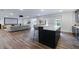 Spacious recreational room offers a wet bar, entertainment area, and modern finishes at 4992 Concert Ln, Marietta, GA 30066