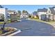 The gated community offers paved roads and mature trees to enhance the neighborhood's appeal at 4992 Concert Ln, Marietta, GA 30066