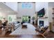 Bright living room with hardwood floors, high ceilings, brick fireplace, and plenty of natural light at 4992 Concert Ln, Marietta, GA 30066