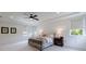 Bright and airy main bedroom featuring large windows, a comfortable bed, and stylish décor at 4992 Concert Ln, Marietta, GA 30066