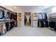 Spacious walk-in closet with custom shelving and ample storage space for an extensive wardrobe at 4992 Concert Ln, Marietta, GA 30066