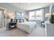 Comfortable bedroom with ample natural light and stylish decor at 5315 Trescott Path, Cumming, GA 30028