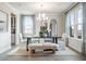 Elegant dining room featuring a chandelier, large windows, and a neutral color palette for a welcoming atmosphere at 5315 Trescott Path, Cumming, GA 30028