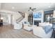 Inviting living room with fireplace, neutral decor, and open floor plan at 5315 Trescott Path, Cumming, GA 30028
