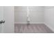 Empty walk-in closet with carpeted floor and white walls, ready for customization at 5315 Trescott Path, Cumming, GA 30028