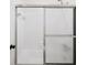 Bathroom shower with stainless steel shower frame and white tile at 76 Forrest Pl, Atlanta, GA 30328