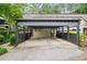 Exterior view of the carport that provides covered parking for the residence at 76 Forrest Pl, Atlanta, GA 30328