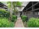 Inviting front entrance with a walkway lined with lush greenery leading to the front door at 76 Forrest Pl, Atlanta, GA 30328