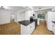Bright open kitchen with stainless appliances, granite counters and new flooring at 76 Forrest Pl, Atlanta, GA 30328