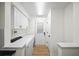 Convenient laundry room with washer, dryer, and exterior access at 76 Forrest Pl, Atlanta, GA 30328