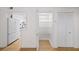View of the kitchen, pantry and closet featuring new flooring at 76 Forrest Pl, Atlanta, GA 30328