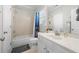 Well-lit bathroom featuring a shower-tub combo and single sink vanity at 998 Regal Hills Ln, Mableton, GA 30126