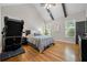 Bedroom with wood floor, high ceilings, ceiling fan and windows at 998 Regal Hills Ln, Mableton, GA 30126