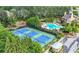 Community amenities include tennis courts and pool with mature trees at 998 Regal Hills Ln, Mableton, GA 30126