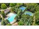 Aerial view of the community pool and tennis courts, showcasing the recreational amenities at 998 Regal Hills Ln, Mableton, GA 30126