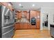Spacious kitchen with stainless steel appliances, hardwood floors, and ample cabinet space at 998 Regal Hills Ln, Mableton, GA 30126