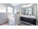 Bathroom featuring double sink vanity and soaking tub at 3454 Benthollow Ln, Duluth, GA 30096