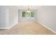 Dining room featuring a classic light fixture and lots of natural light at 3454 Benthollow Ln, Duluth, GA 30096