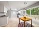 Bright kitchen features stainless steel appliances, lots of storage, and access to the backyard at 3454 Benthollow Ln, Duluth, GA 30096