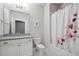 Bathroom featuring white vanity, grey counter, tub, and neutral paint at 3949 Glenview Club Ln, Duluth, GA 30097