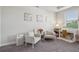 Bright bedroom featuring two chairs, vanity, carpet floor, natural light and tray ceiling at 3949 Glenview Club Ln, Duluth, GA 30097