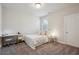 Bedroom with a bed, desk, carpet floor, natural light and neutral paint at 3949 Glenview Club Ln, Duluth, GA 30097