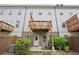 Home exterior view showcasing a patio, wooden fence, and upper-level deck at 3949 Glenview Club Ln, Duluth, GA 30097