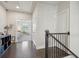 Upstairs hallway with hardwood floors leads to rooms with white doors at 3949 Glenview Club Ln, Duluth, GA 30097