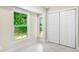 Inviting bedroom featuring generous closet space, natural light, and bright floors and walls at 4043 Chedworth Way, Stone Mountain, GA 30083