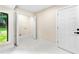 Functional laundry room featuring closet space, marble tile floors and a view at 4043 Chedworth Way, Stone Mountain, GA 30083