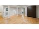 Finished basement featuring hardwood floors, a Murphy bed and an adjacent bathroom for versatile living at 513 Boulevard Se, Atlanta, GA 30312