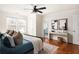 Bright bedroom with a ceiling fan, with a view into an ensuite bathroom at 513 Boulevard Se, Atlanta, GA 30312