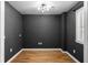 Study room featuring hardwood floors, dark paint, and a window offering a modern workspace at 513 Boulevard Se, Atlanta, GA 30312