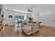 Spacious recreational room features hardwood floors, a pool table, a foosball table and comfortable seating at 1421 Hendon Rd, Woodstock, GA 30188