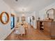 Elegant dining room features hardwood floors, a wooden buffet, modern lighting, and plenty of natural light at 1421 Hendon Rd, Woodstock, GA 30188