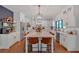 Modern kitchen with stainless steel appliances, ample storage, and marble countertops at 1421 Hendon Rd, Woodstock, GA 30188