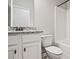 Clean bathroom featuring granite countertops, and a shower-tub combo at 238 Linford Dr, Locust Grove, GA 30248