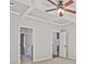 Bedroom with a coffered ceiling and multiple entry points at 238 Linford Dr, Locust Grove, GA 30248
