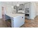 Modern kitchen with granite countertops and stainless steel appliances at 238 Linford Dr, Locust Grove, GA 30248