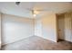 Bright bedroom with neutral walls, carpet, and a ceiling fan at 3601 Gainesway Trce, Duluth, GA 30096